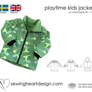 May include: A green children's jacket featuring a dinosaur print. The jacket has a black zip, collar, and cuffs. The text "playtime kids jacket" is displayed above the jacket. The size range is EU 50-158.