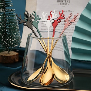 4 piece set Gold Elk Teaspoons