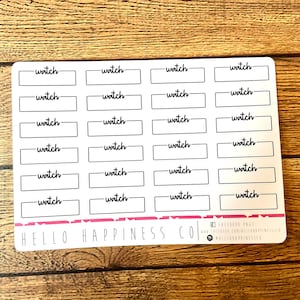 May include: A sheet of white sticker paper with 24 rectangular stickers. Each sticker has a black outline and the word "watch" written in black cursive inside.