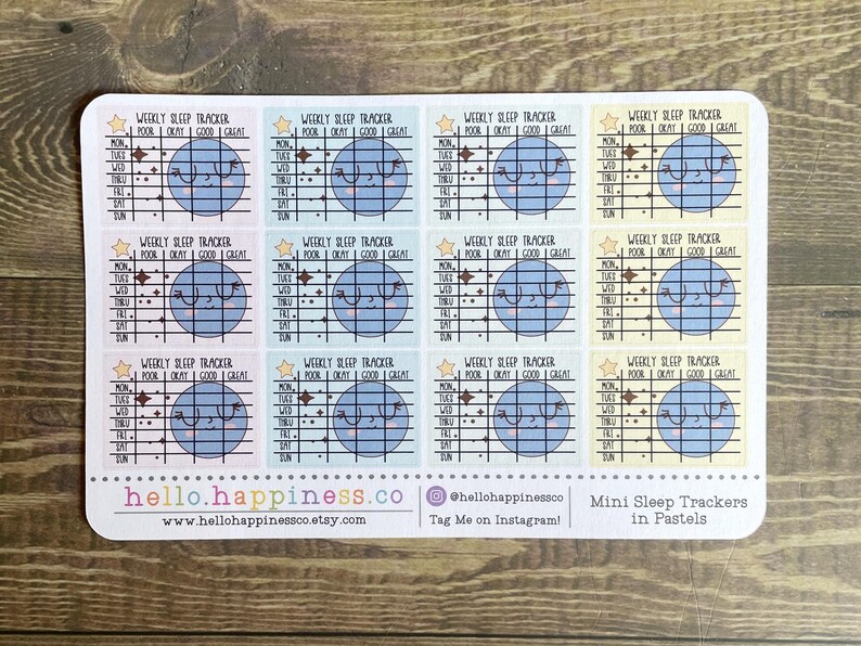 May include: A sheet of pastel-colored stickers with a weekly sleep tracker design. Each sticker features a cute cartoon moon with a face and stars. The stickers are labeled "Weekly Sleep Tracker" and have a scale from "Poor" to "Great".