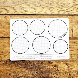 May include: A white sticker sheet with six black-outlined circles, each containing a grid pattern. The phrase "I am worthy" is handwritten in black ink on one circle. The bottom of the sheet includes the text "hello.happiness.co" and "Grid Circles".