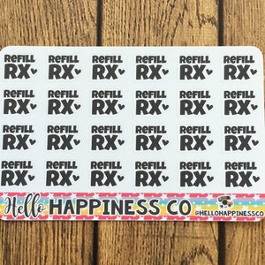 May include: A sheet of 24 white stickers with black text that says "REFILL RX" with a heart symbol. The stickers are arranged in six rows of four. The bottom of the sheet has the text "Hello HAPPINESS CO" and the social media handle "@HELLOHAPPINESSCO".