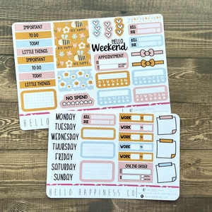May include: A set of colorful planner stickers with a bee and flower theme. The stickers include boxes for to-do lists, appointments, and daily tasks. There are also stickers for days of the week, bill due dates, and work tasks. The stickers are printed on white paper with a glossy finish.