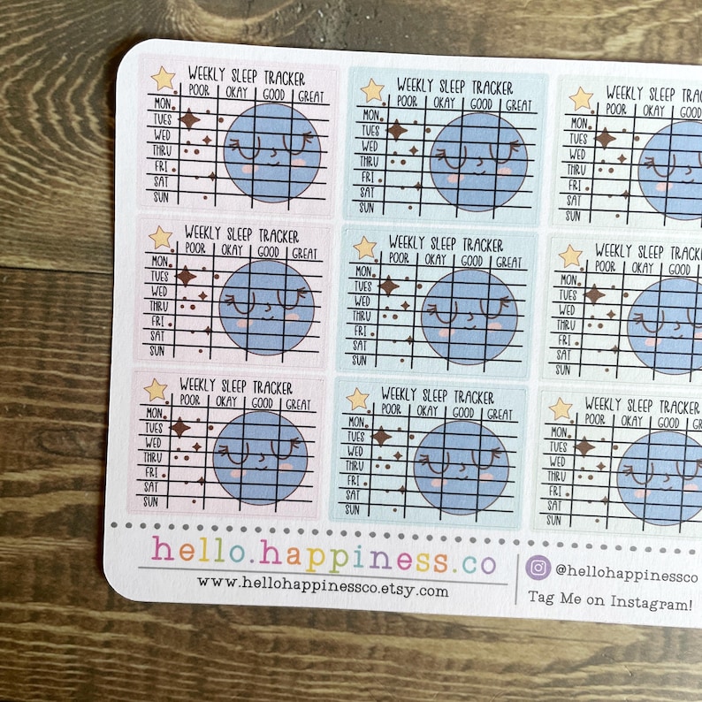 May include: Nine pastel blue and pink stickers with a weekly sleep tracker. Each sticker features a cartoon planet with a smiling face and a grid for tracking sleep quality. The stickers are labeled "Weekly Sleep Tracker" and have a scale of "Poor, Okay, Good, Great".