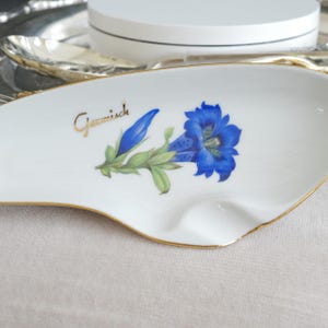 Vintage White Porcelain Ashtray Decorated with Blue Flowers, Gold Trim, and Gold Garmisch