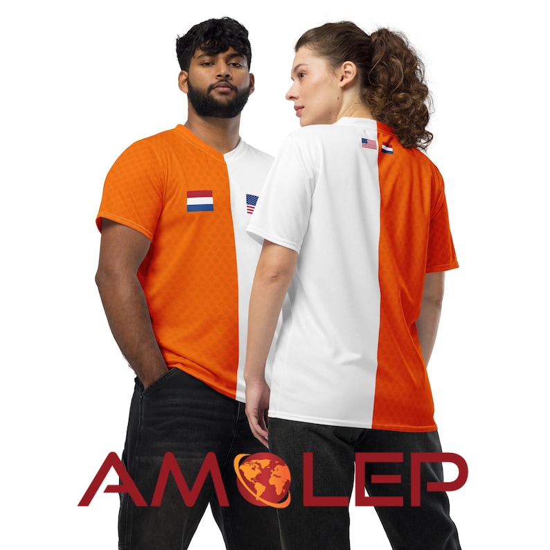 May include: Two people wearing orange and white t-shirts with the American and Dutch flags on them. The shirts are split down the middle, with one side orange and the other white.