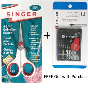 May include: A white and red 4-3/4 inch embroidery scissors with a lifetime guarantee. The scissors are packaged with a free Singer Quick Fix Travel Kit, which includes needles, thread, and buttons. The kit is labeled "Fly Friendly" and includes 12 pieces.