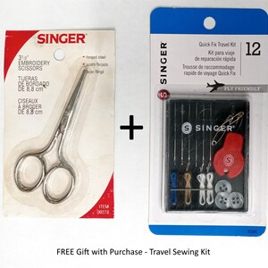 May include: A Singer brand 3 1/2 inch embroidery scissors packaged in a white and red box with the text "Singer" in black. Next to the scissors is a Singer brand travel sewing kit in a clear plastic package with a red and white design. The sewing kit includes needles, thread, a thimble, buttons, and a safety pin. The text "Quick Fix Travel Kit" and "Fly Friendly" are printed on the package.
