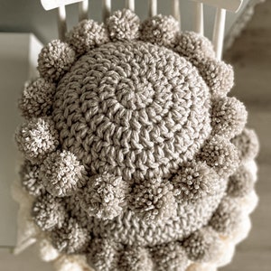 round pom pom pillow
