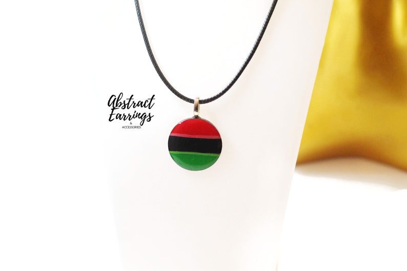 Pan African Flag Pendant Necklace - Unisex Afrocentric Charm -  Wooden Resin Art Charm - Gift for Him Her - Juneteenth Celebration Fashion by Abstract Earrings & Accessories