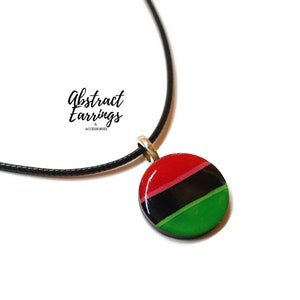 Pan African Flag Pendant Necklace - Unisex Afrocentric Charm -  Wooden Resin Art Charm - Gift for Him Her - Juneteenth Celebration Fashion by Abstract Earrings & Accessories