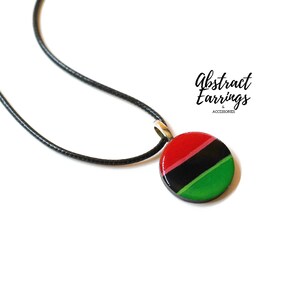 Pan African Flag Pendant Necklace - Unisex Afrocentric Charm -  Wooden Resin Art Charm - Gift for Him Her - Juneteenth Celebration Fashion by Abstract Earrings & Accessories