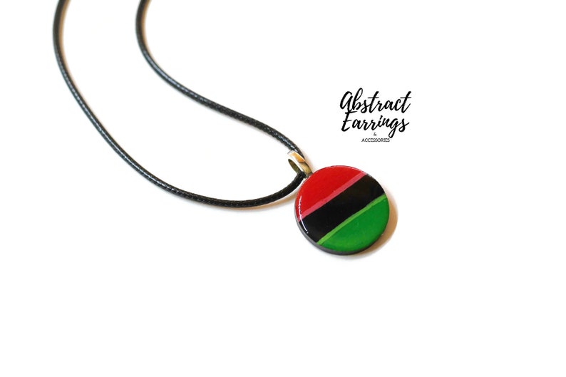 Pan African Flag Pendant Necklace - Unisex Afrocentric Charm -  Wooden Resin Art Charm - Gift for Him Her - Juneteenth Celebration Fashion by Abstract Earrings & Accessories