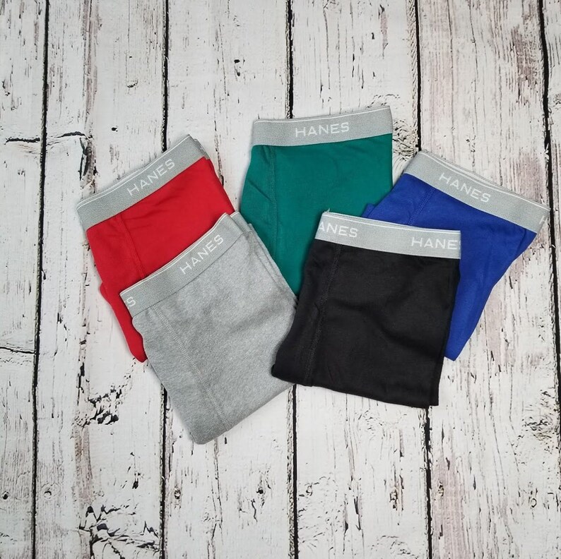 Color options for boxer briefs. Black, grey, blue, red, and green.