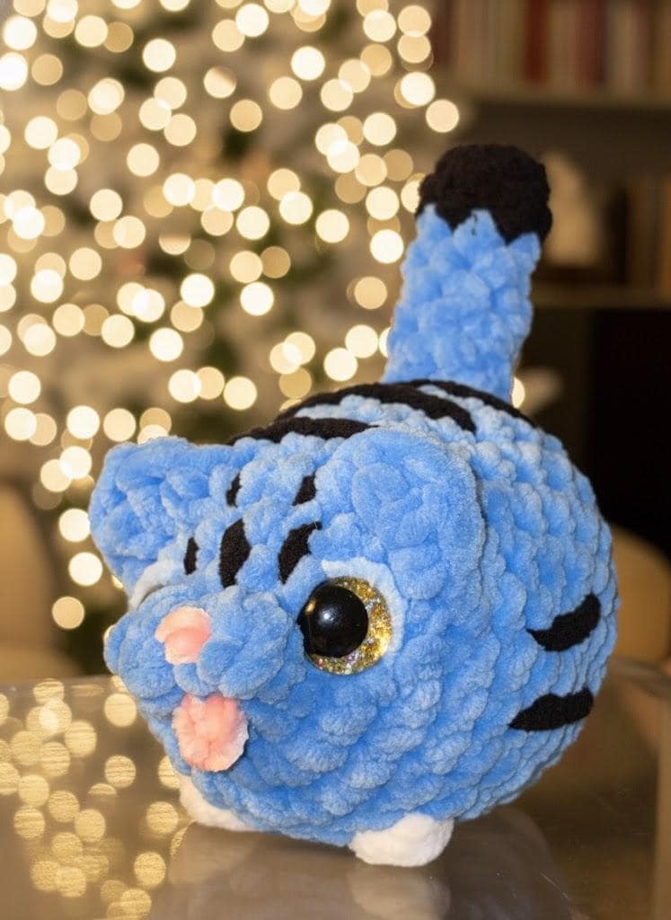 30 Tiger Crochet Patterns: Realistic, Cute, and Giftable Designs for Every Crocheter 17 Blue Derpy Tiger Crochet Pattern | Quick Amigurumi
