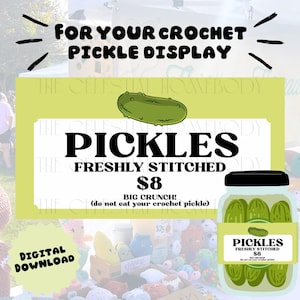 May include: A digital download sign for a crochet pickle display. The sign features the word "PICKLES" in large black letters, with "FRESHLY STITCHED" below. A jar of crochet pickles is also shown.