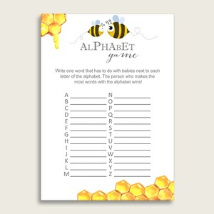 May include: A printable baby shower game with a honeycomb pattern and two cartoon bees. The game instructs players to write one word related to babies for each letter of the alphabet.