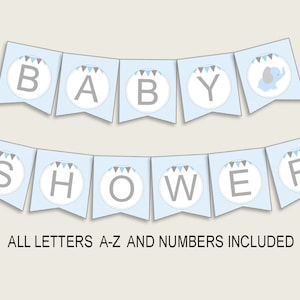 Peut inclure: Bannière de fête prénatale bleue et grise avec les mots "BABY SHOWER" et une petite illustration d'éléphant gris. La bannière comprend toutes les lettres A-Z et les chiffres.
