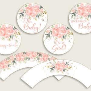 May include: Pink and gold floral cupcake wrappers with the text "Mommy-to-be", "Oh. Baby!", "It's a Girl!", and "Welcome Baby".