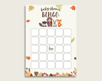 May include: A printable baby shower bingo card with a woodland theme. The card features a raccoon, bear, bunny, and fox. The card has a free space in the center and 24 other spaces to fill in.