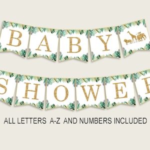 Puede incluir: Una pancarta blanca con letras doradas brillantes que deletrean "BABY SHOWER" con hojas verdes y siluetas de animales doradas. El texto "ALL LETTERS A-Z AND NUMBERS INCLUDED" está debajo de la pancarta.