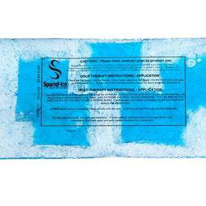 May include: Blue and white Spand-Ice brand reusable cold and hot therapy gel pack. The pack has instructions for cold and hot therapy use. The text on the pack reads "CAUTION! Please read carefully prior to product use. COLD THERAPY INSTRUCTIONS/APPLICATION HEAT THERAPY INSTRUCTIONS/APPLICATION UGE EXTREME CAUTION DO NOT OVERHEAT THE GEL BAG IN THE MICROWAVE AS THIS MAY CAUSE A SEVERE BURN. Carefully place the heated Gel Pouch onto the skin. ALWAYS use Gel Pouch during your treatment. Gel Bag ingredients are non-toxic, and latex free. If,  unlikely event that there is exposure to the eyes, immediately flush with water and seek medical treatment as a precaution."
