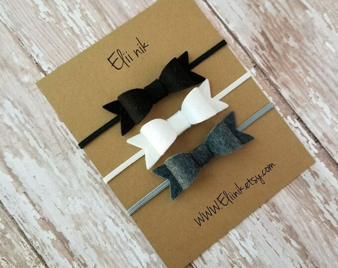 Babyhug Hairband with Bow & Ear Applique Free Size - Black & Red main image 1