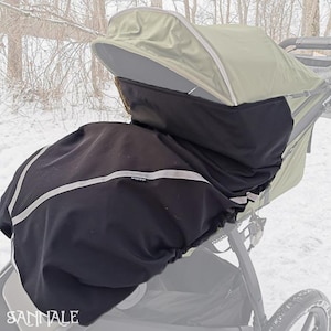 Fußabdeckung für Urban Glide 2, Urban Glide 3 oder Urban Glide 4. Wind- und wasserdichte Fußabdeckung aus schwarzem Softshell.