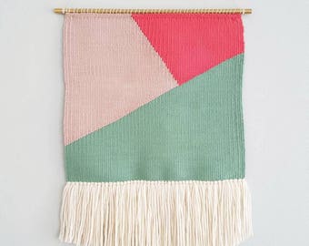 Woven Wall Hanging, geometric design with, minty sea green, dusty pink and neon pink. Colorful pattern, ivory fringe. Ready to ship!