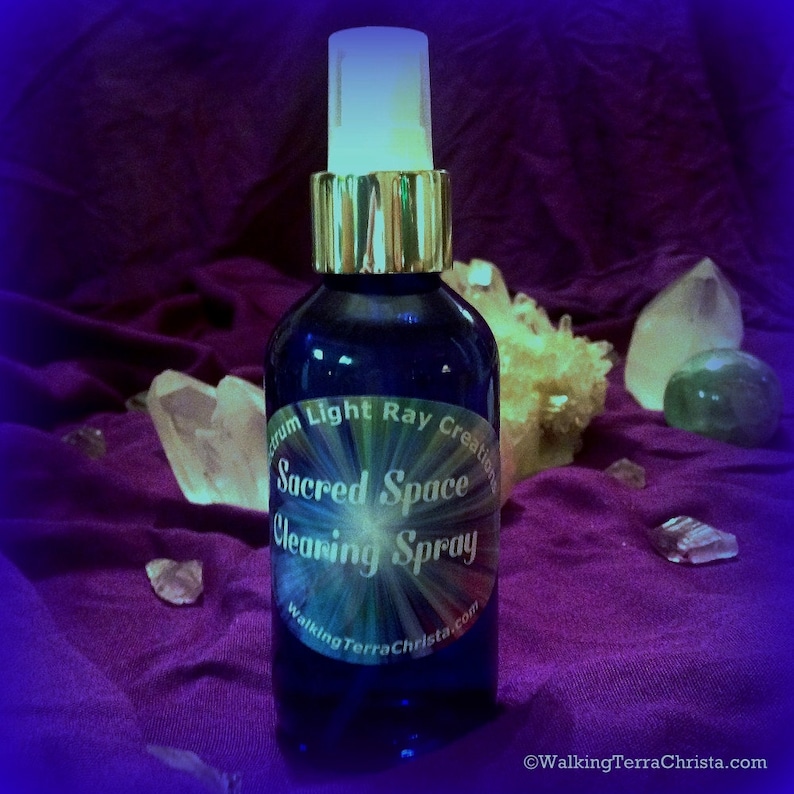 4 ounce Sacred Space Spray infused with Essential Oils of Sage, Hyssop and Geranium. Blue glass bottle with aerosol pump sprayer. Use for meditation or general aura clearing. Keep one by the front door for use when entering the house.