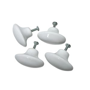 May include: Four white ceramic cabinet knobs with silver screws. The knobs have a smooth, glossy finish and a classic oval shape. These knobs are suitable for drawers, cabinets, or other furniture.