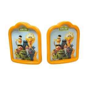 Vintage Sesame Street Book Ends Yellow Plastic- Muppets 1980- vintage kids decor- collectible