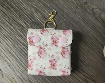 keychain earbud case. mini wallet. cord keeper. headphone case
