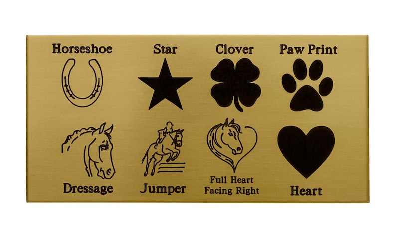May include: A gold-coloured metal plate with various horse-themed designs engraved on it. The designs include a horseshoe, a star, a clover, a paw print, a horse's head, a horse jumping over a hurdle, a horse's head inside a heart, and a heart. The designs are labelled with their names: Horseshoe, Star, Clover, Paw Print, Dressage, Jumper, Full Heart Facing Right, and Heart.