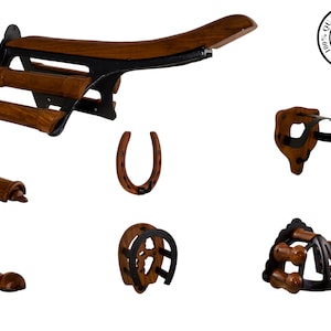 May include: A set of wooden and metal equestrian wall hooks for hanging saddles, bridles, and other horse tack. The set includes a saddle rack, a bridle hook, a horseshoe hook, and a stirrup hook. The hooks are made of dark wood and black metal.