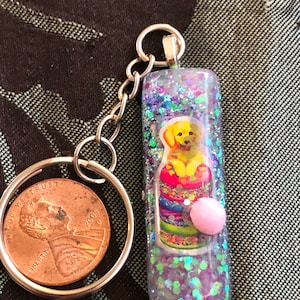 Cute puppy with macaroons keychain