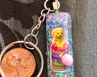 Cute puppy with macaroons keychain