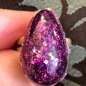 Small purple glitter resin ring