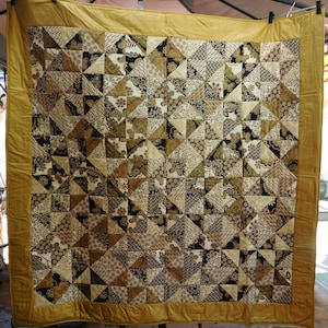 Black and Gold Floral Quilt