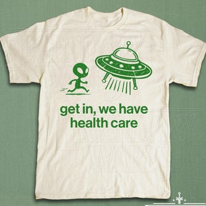 Get In We Have Healthcare Alien Shirt, Funny Graphic Tee, UFO Space Humor, Silly Gift For Her, Retro Sci-Fi Meme Tshirt, Y2K Vintage Shirt