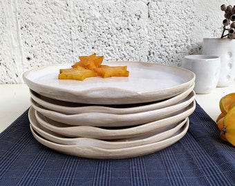 6 white ceramic plate set with irregular rim, handmade in Israel