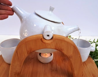 White Ceramic Teapot for Two on a wooden Tray