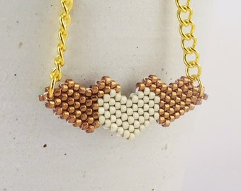 Trio of hearts necklace, Gold and cream interlocking heart pendant, Beadweaving necklace