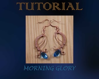 May include: Copper wire earrings with blue teardrop-shaped beads. The earrings are shaped like a stylized flower and have a delicate, feminine design. The earrings are labeled "Morning Glory".