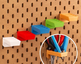 Universal strong holder up to 5 scissors or pliers for your Ikea Skadis pegboards. Available in different colors