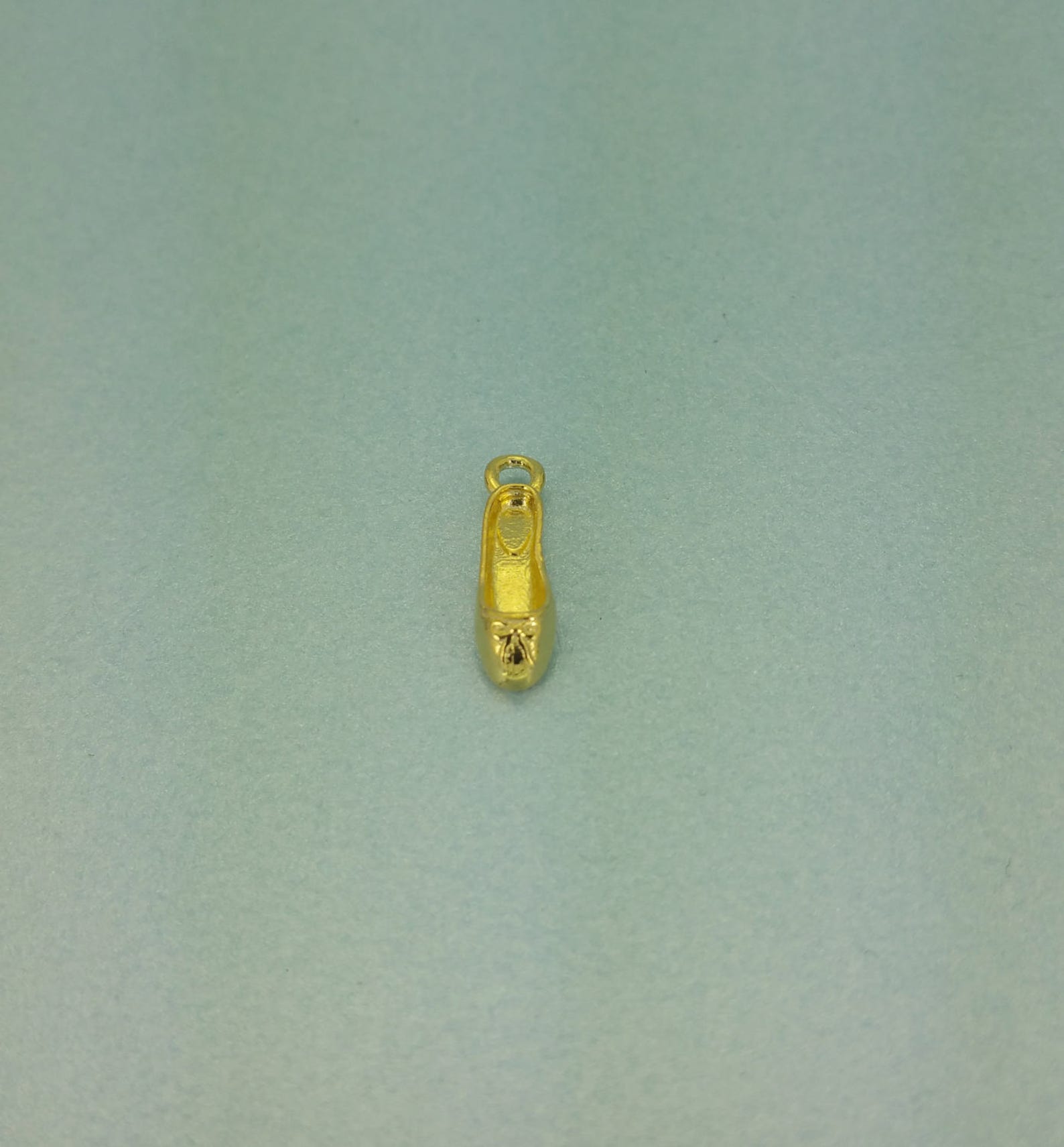 gold vermeil ballet slipper/shoe charm. delicate gold vermeil ballet slipper, perfect for a necklace or pendant.