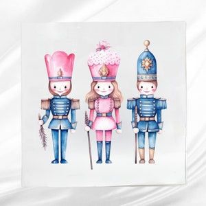 May include: Three watercolor nutcracker figurines, one in pink, one in blue, and one in a pink and white cupcake costume. The figurines are standing on a white background.