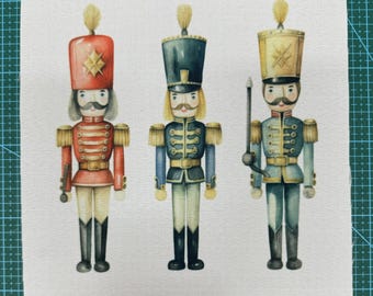 May include: Three toy soldier nutcrackers with painted details. The nutcracker on the left is wearing a red uniform with gold trim and a black hat. The nutcracker in the middle is wearing a blue uniform with gold trim and a black hat. The nutcracker on the right is wearing a blue uniform with gold trim and a yellow hat.