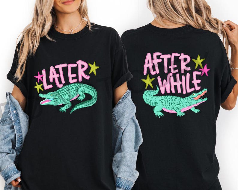 May include: Black t-shirts with a teal alligator graphic and the phrases "LATER" and "AFTER WHILE" in pink lettering. The design includes yellow and pink star accents. The shirts are a casual style.