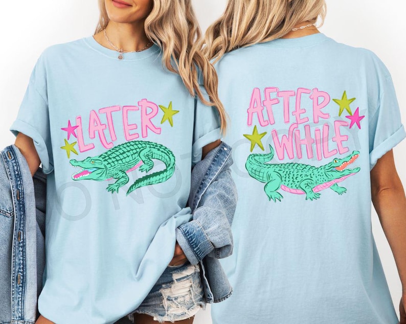 May include: Light blue t-shirt with a green alligator graphic and the text "LATER" on the front. The back of the shirt features the text "AFTER WHILE" and a matching alligator graphic. Pink and yellow stars accent the text.